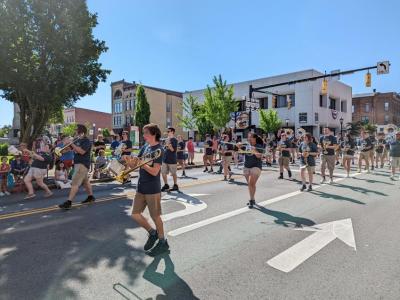 Members of the Tiffin Columbian Marching Band are seen on Washington Street during the 2022 Memorial Day Parade in Downtown Tiffin.