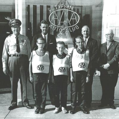 group with AAA Vests