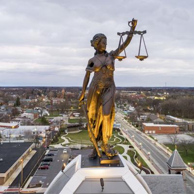 Lady Justice on the top of the Seneca County Justice Center